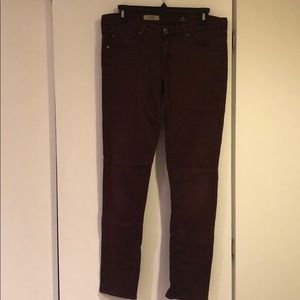 AG maroon cigarette leg jeans